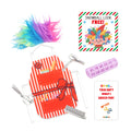 Christmas elf prop set with barber apron, colorful wig, hair roller, salon tools, and activity cards