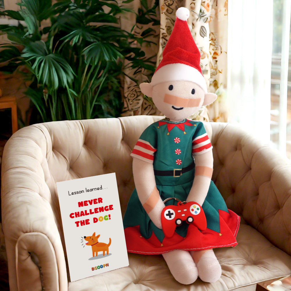 Christmas elf prop set with game controller keychain, bandage strips, and activity card for holiday elf scene display
