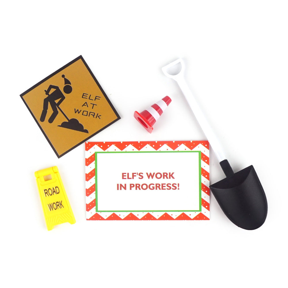 Christmas elf prop set with mini shovel, traffic cone, road work signs, and activity card for a holiday elf display.