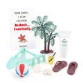 Christmas elf prop set with beach ball, mini tools, flip flops, palm tree, and activity cards for holiday elf scene display