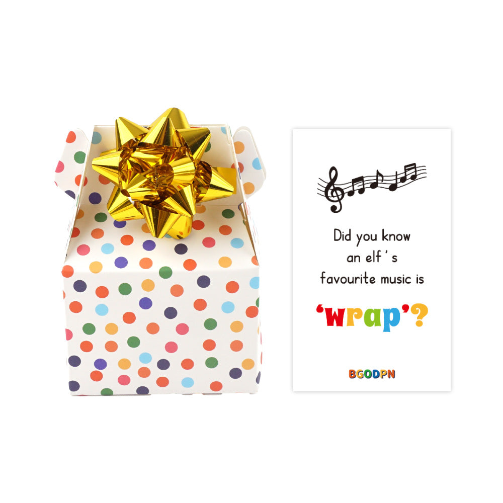 Christmas elf prop set with polka dot gift box, gold gift bow, and activity card for holiday elf display