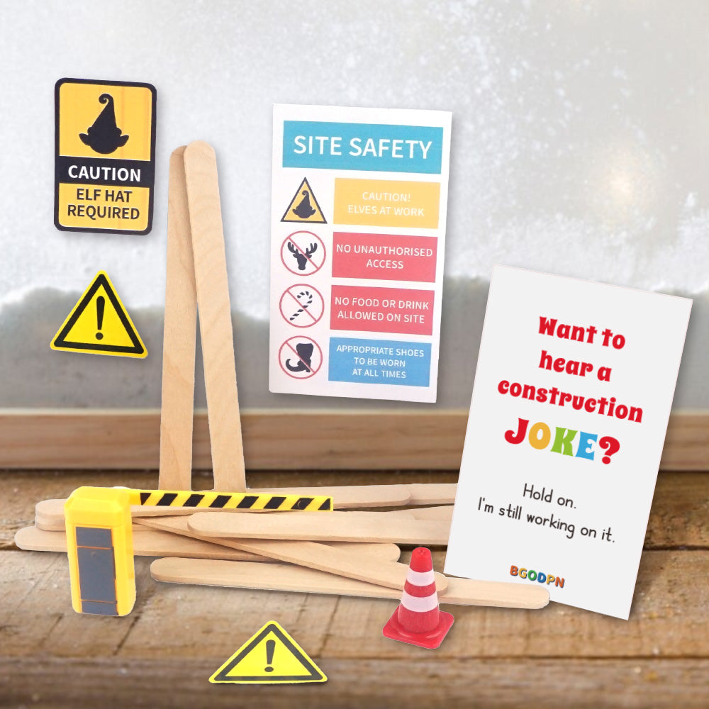 Christmas elf prop set with wooden craft sticks, traffic cone, parking gate, warning signs, and activity cards for holiday elf scene display
