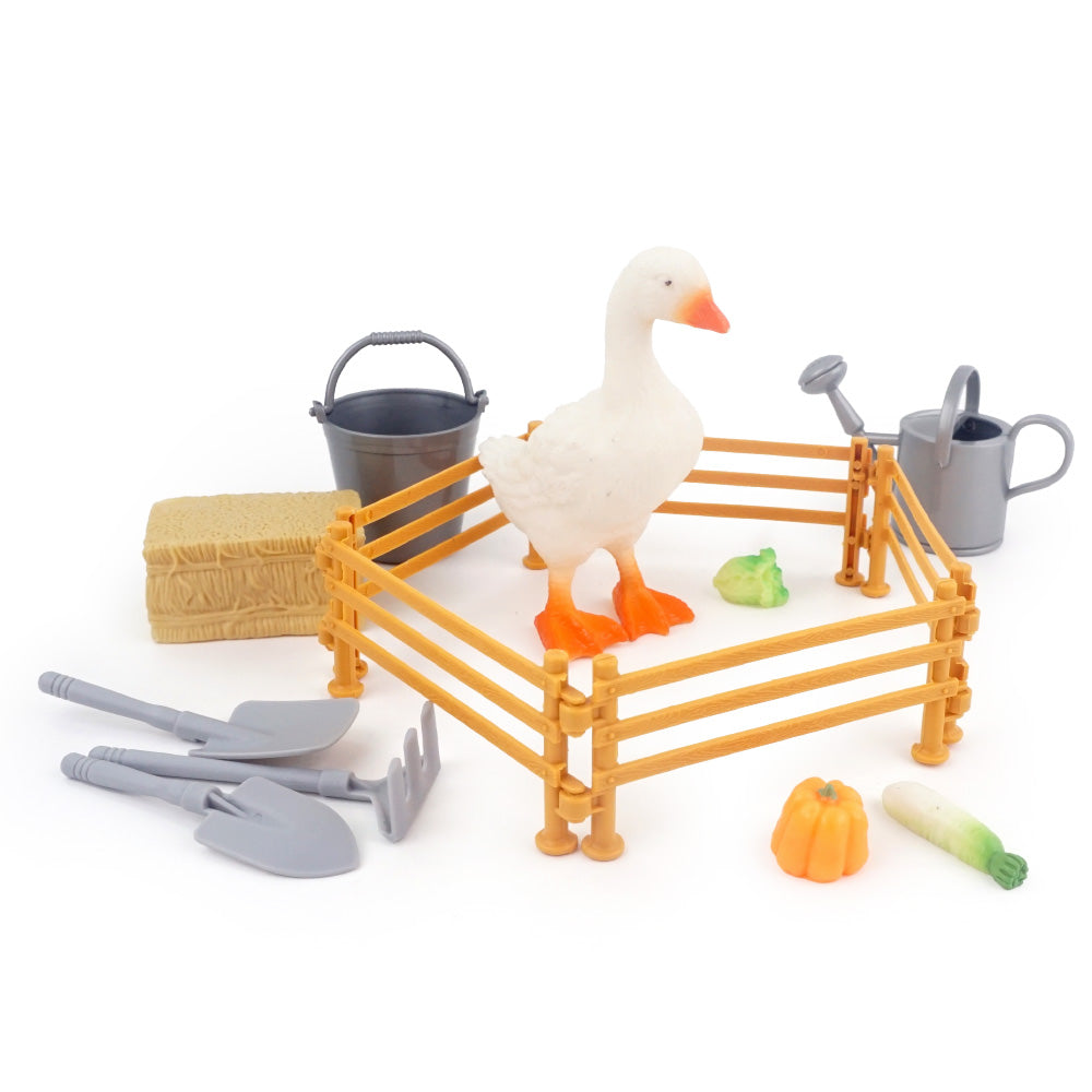 Christmas elf prop set with farm fence, wheelbarrow, tools, mini vegetables, goose figure, and activity card for holiday elf scene display