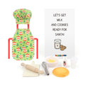 Christmas elf prop set with chef hat, apron, baking tools, milk, dough, and activity card.