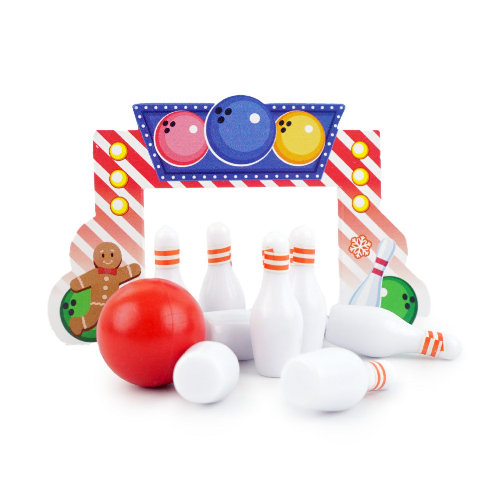 Christmas elf prop set with bowling backdrop, pins, and ball for a holiday elf display.