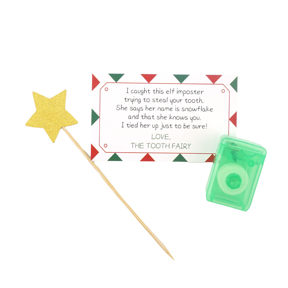 Christmas elf prop set with tooth fairy note card, gold star wand, and tooth box for a holiday elf display.