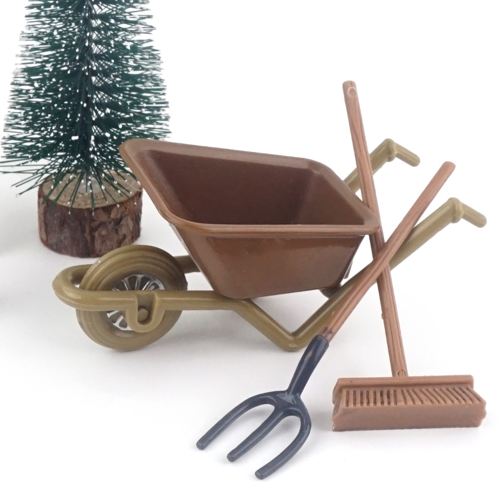 Christmas elf prop set with mini tree, wheelbarrow, tools, star jar, and activity cards for holiday elf display