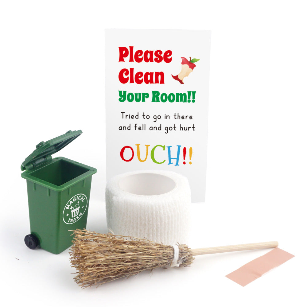 Christmas elf prop set with mini trash bin, broom, bandages, and cleanup activity card.