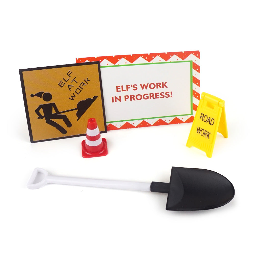 Christmas elf prop set with mini shovel, traffic cone, road work signs, and activity card for a holiday elf display.