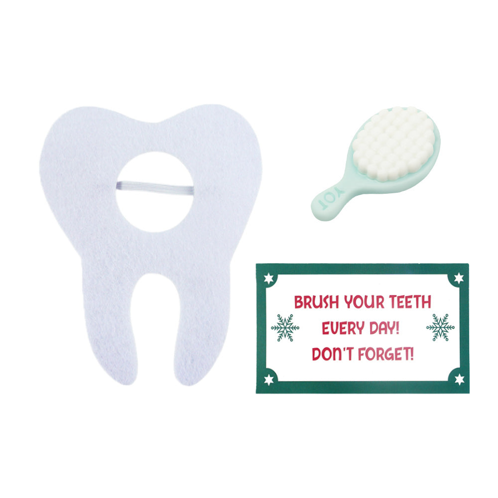 Christmas elf prop set with tooth costume, toothbrush, and reminder card for a holiday elf display.