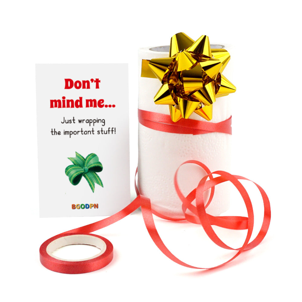 Christmas elf prop set with gold gift bow, red tape roll, and activity card for holiday elf scene display