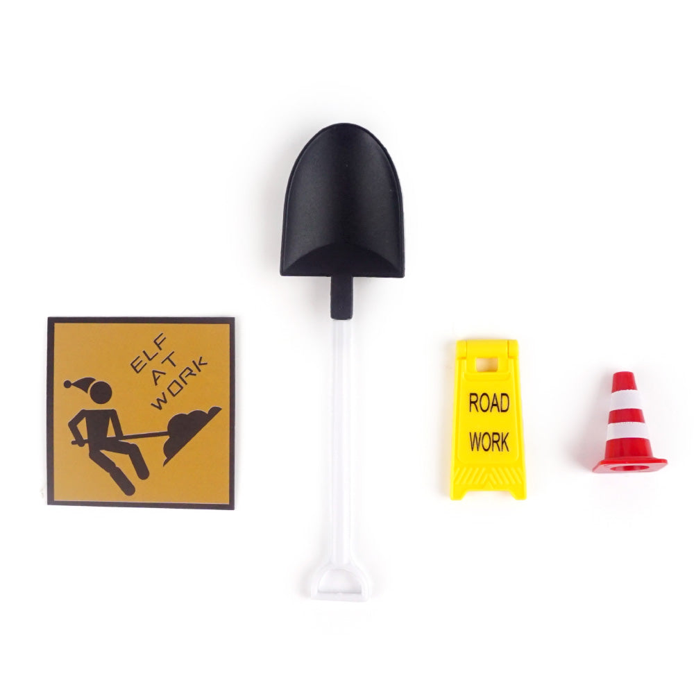 Christmas elf prop set with mini shovel, traffic cone, road work signs, and activity card for a holiday elf display.