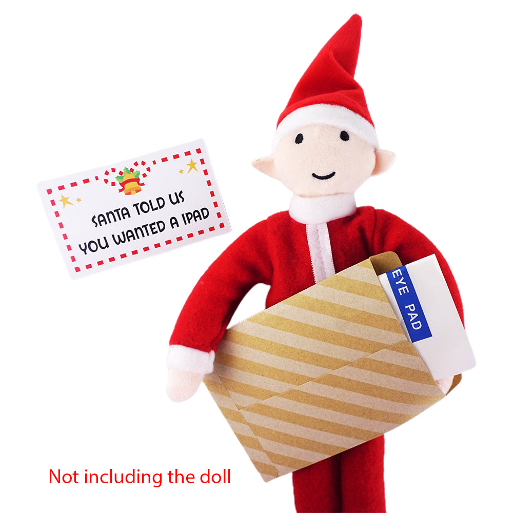 Christmas elf prop set with eye pad packet, paper envelope, and prank card for a holiday elf display.