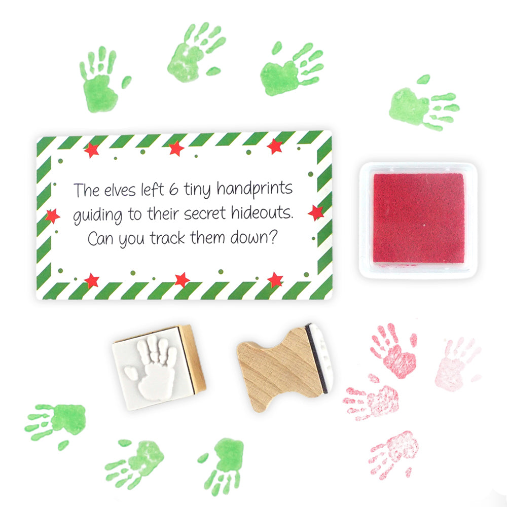Christmas elf prop set with handprint stamps, red ink pad, and activity card for a holiday elf display.
