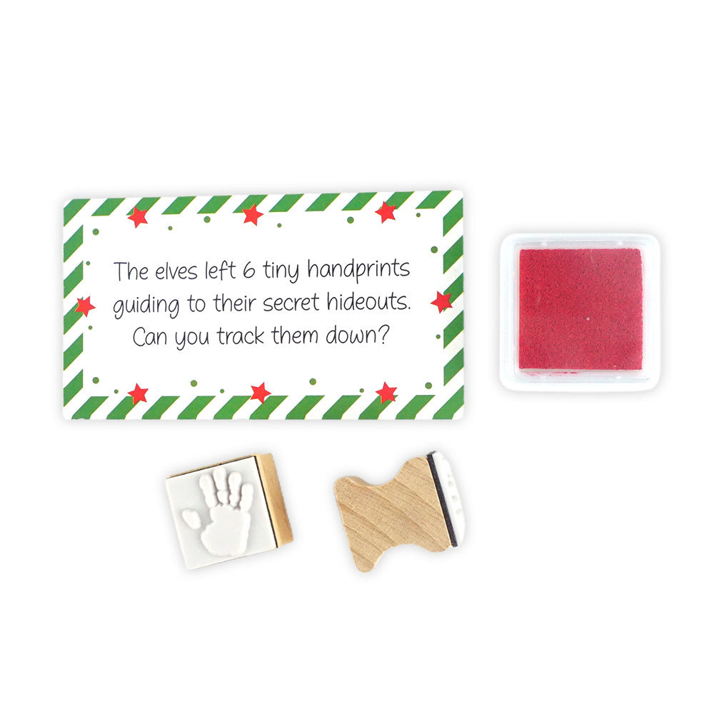 Christmas elf prop set with handprint stamps, red ink pad, and activity card for a holiday elf display.
