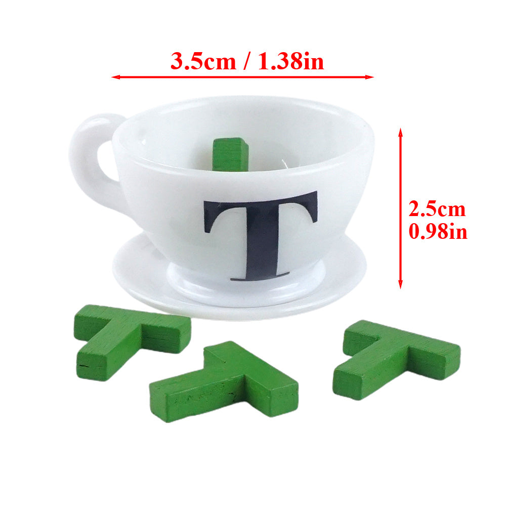 Christmas elf prop set with mini teacup, letter T pieces, and card for a holiday elf display.