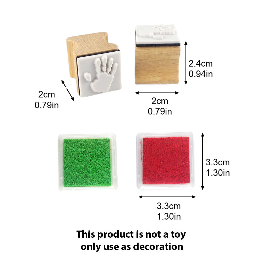Christmas elf prop set with handprint stamps, red ink pad, and activity card for a holiday elf display.
