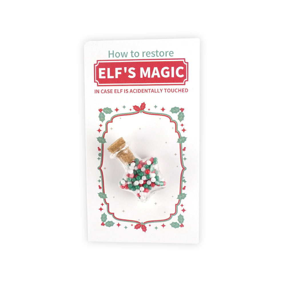 Christmas elf prop set with magic note card and star bottle for a holiday elf display.
