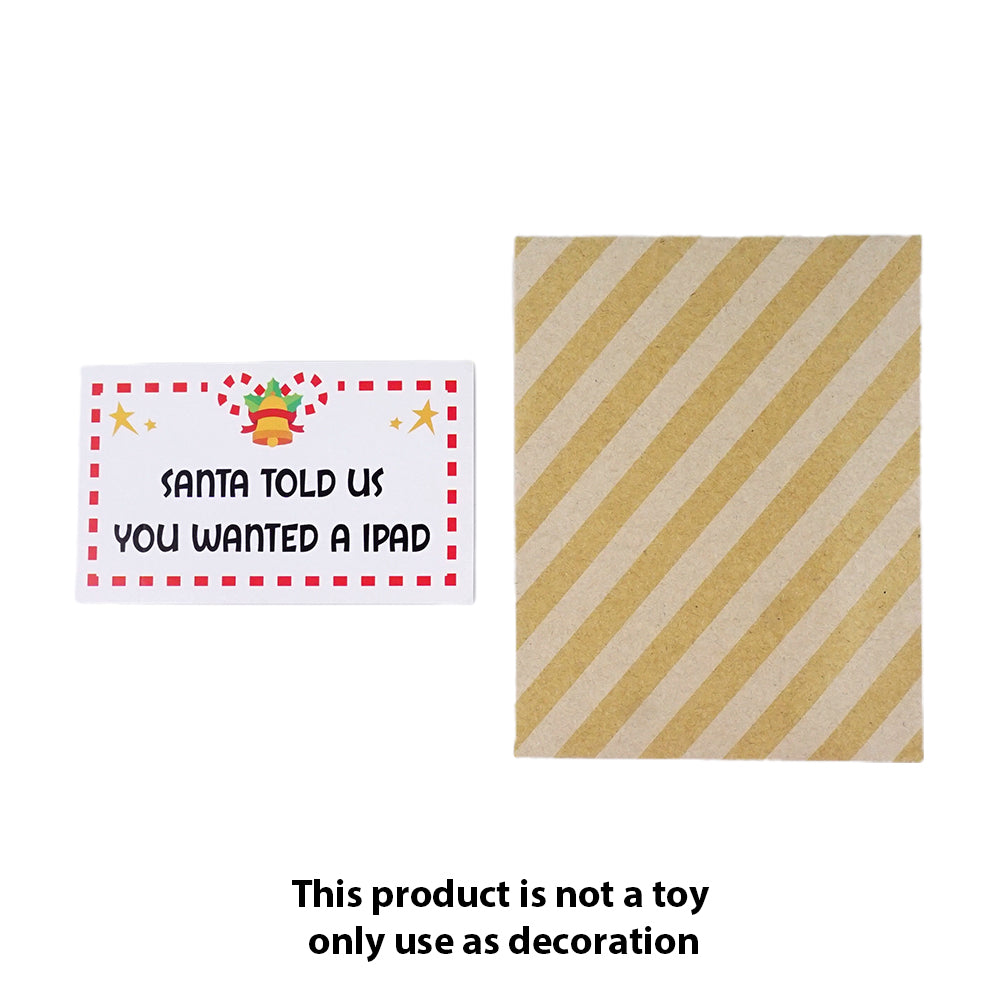 Christmas elf prop set with eye pad packet, paper envelope, and prank card for a holiday elf display.